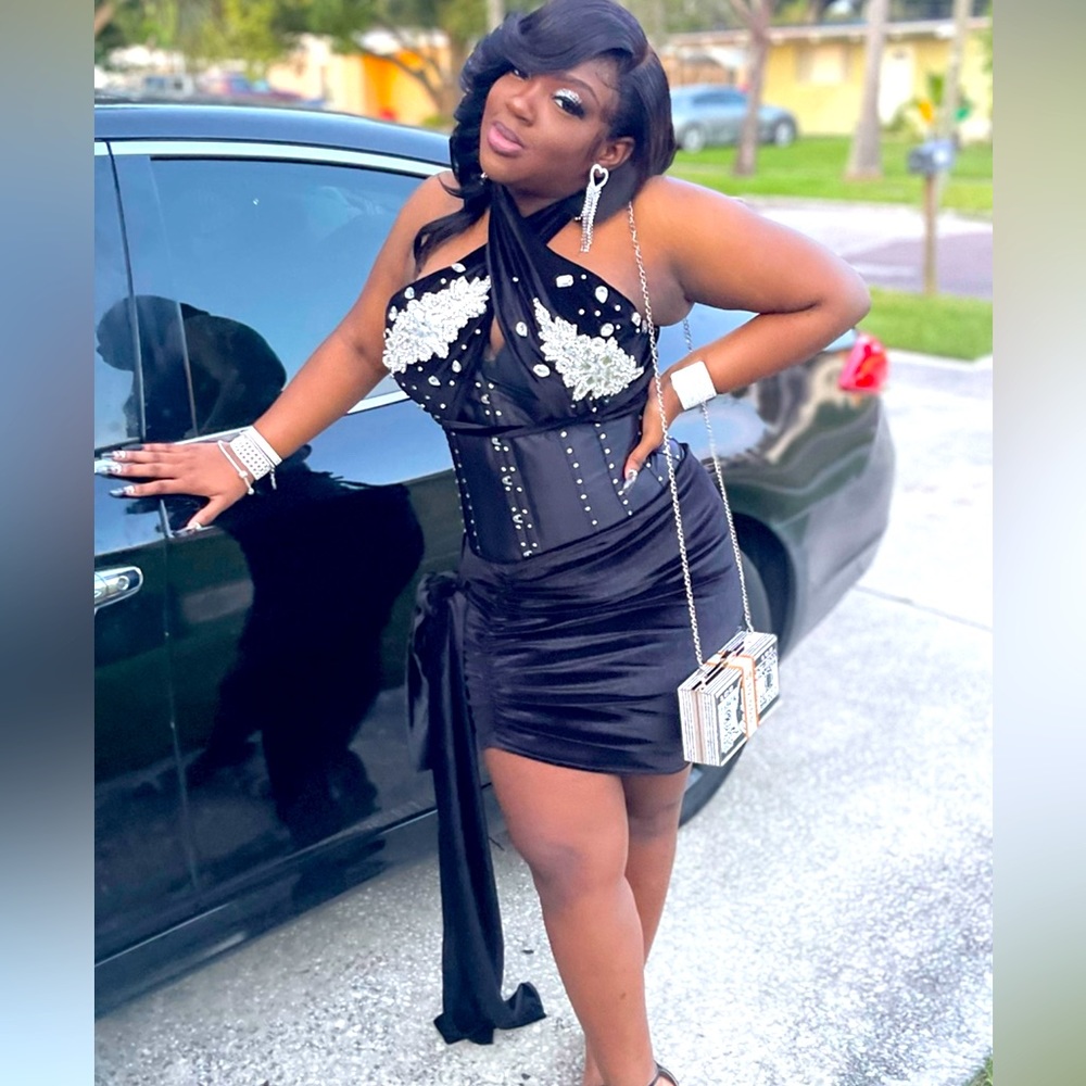 This is a 3 piece homecoming dress with corset black with silver diamonds